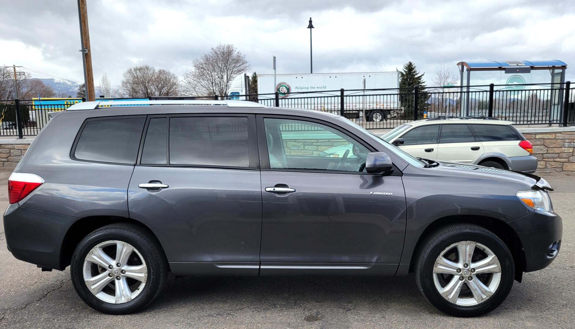 2010 Charcoal /Tan Toyota Highlander Limted (5TDDK3EH9AS) with an 3.5L v6 engine, 5 Speed Automatic transmission, located at 450 N Russell, Missoula, MT, 59801, (406) 543-6600, 46.874496, -114.017433 - One Owner. 3.5L V6 Engine. Four Wheel Drive. Automatic. Heated leather Seats. Power Seats. 3rd Row Seating. Power Sunroof. Rear Entertainment. Navigation. Bluetooth. Air. Cruise. Tilt. Power Windows and Locks. Backup Camera. - Photo#4